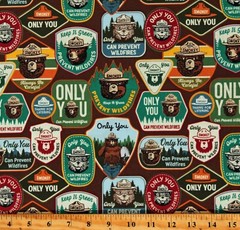Cotton Smokey The Bear Words Brown Fabric Print by Yard D787.18
