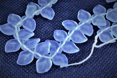 45 Vintage frosted Blue glass, wavy leaf beads. 7x10mm – made in Germany.